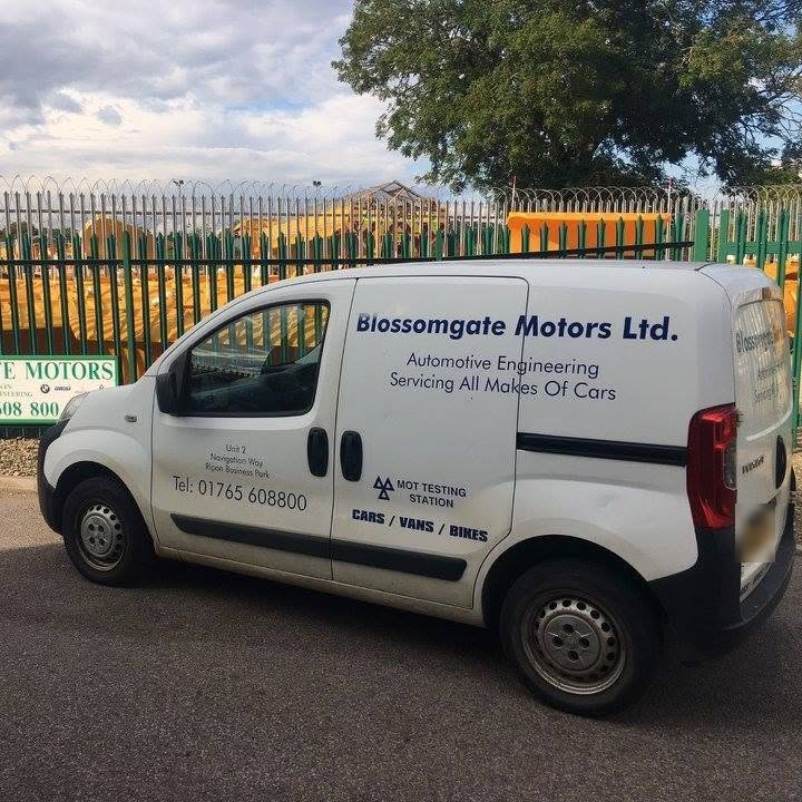 The white Blossomgate Motors Ltd. van with Automotive Engineering and MOT Testing Station livery
